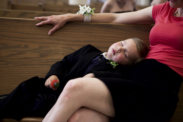 kid sleeping during ceremony - wedding photo by top Denver based wedding photographer Hardy Klahold